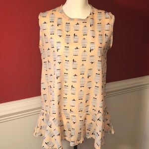 Birdcage tank with ruffle hem